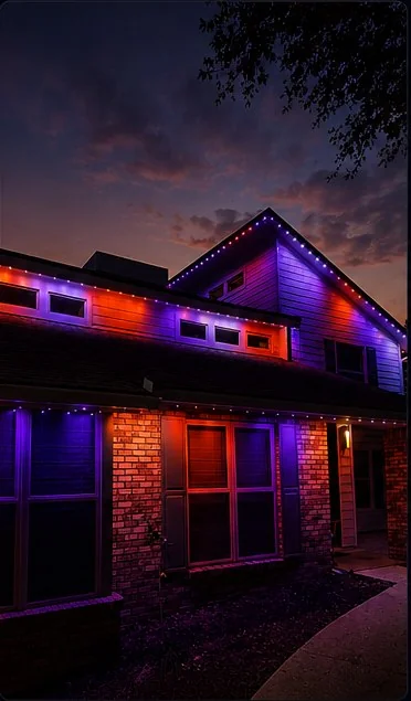 Halloween roofline lighting scene on a two-story home