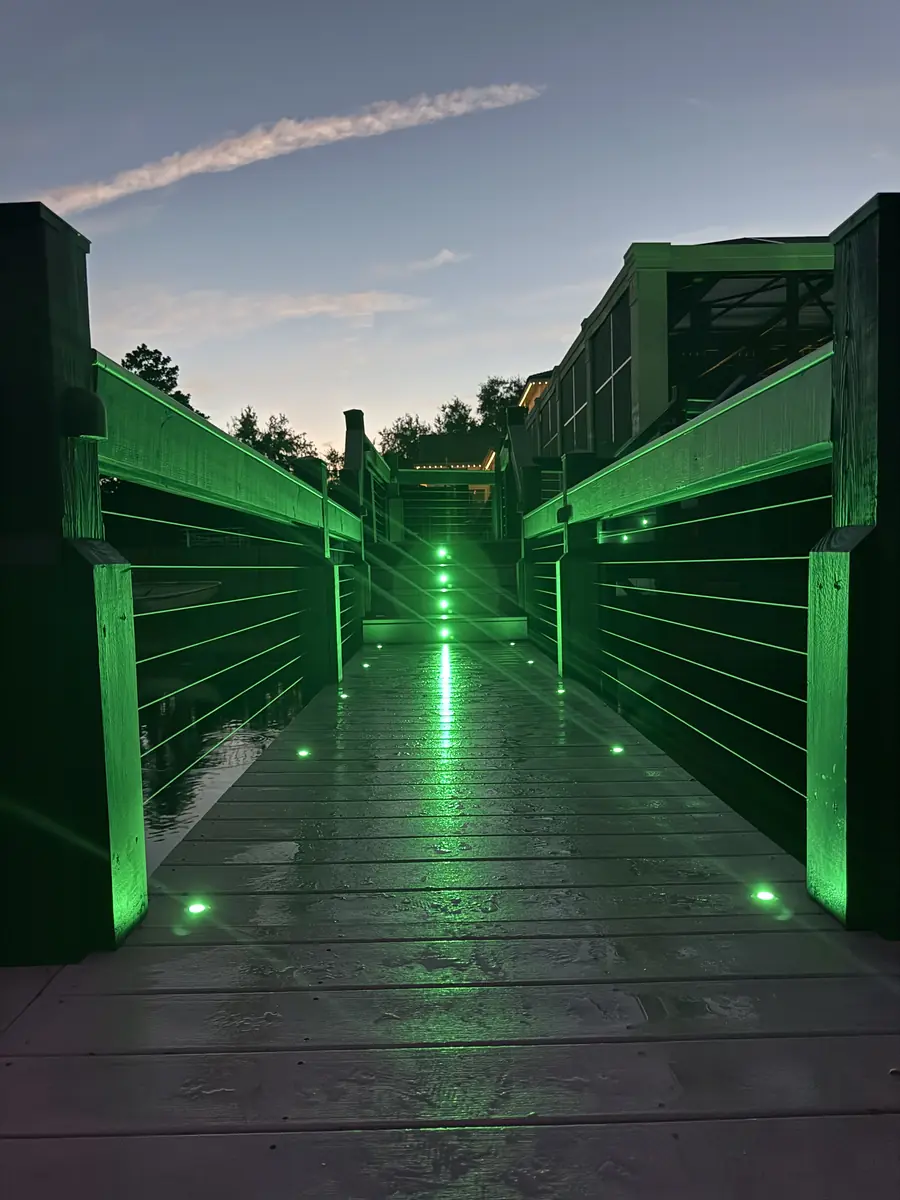 Dock walkway lit in green — fresh