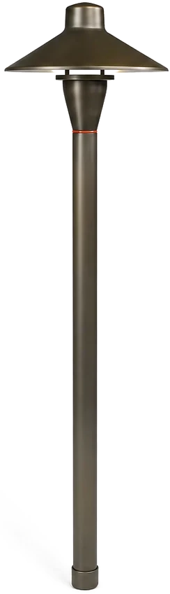 Brighter Nights solid brass pathway fixture with a wide hat shade, shown against the night