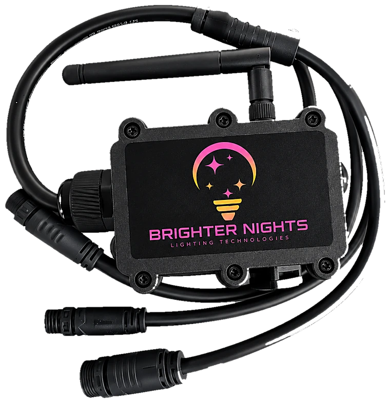 The Brighter Nights Lighting Technologies repeater - a sealed black enclosure with an antenna and waterproof low-voltage connector leads